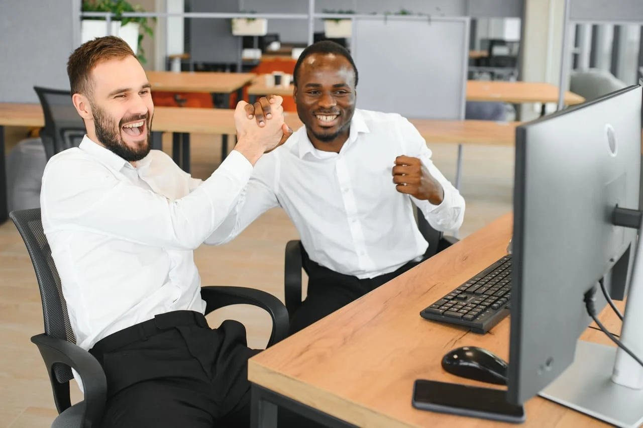 Customer celebrating with web developer the new website SEO web design company Branchburg NJ
